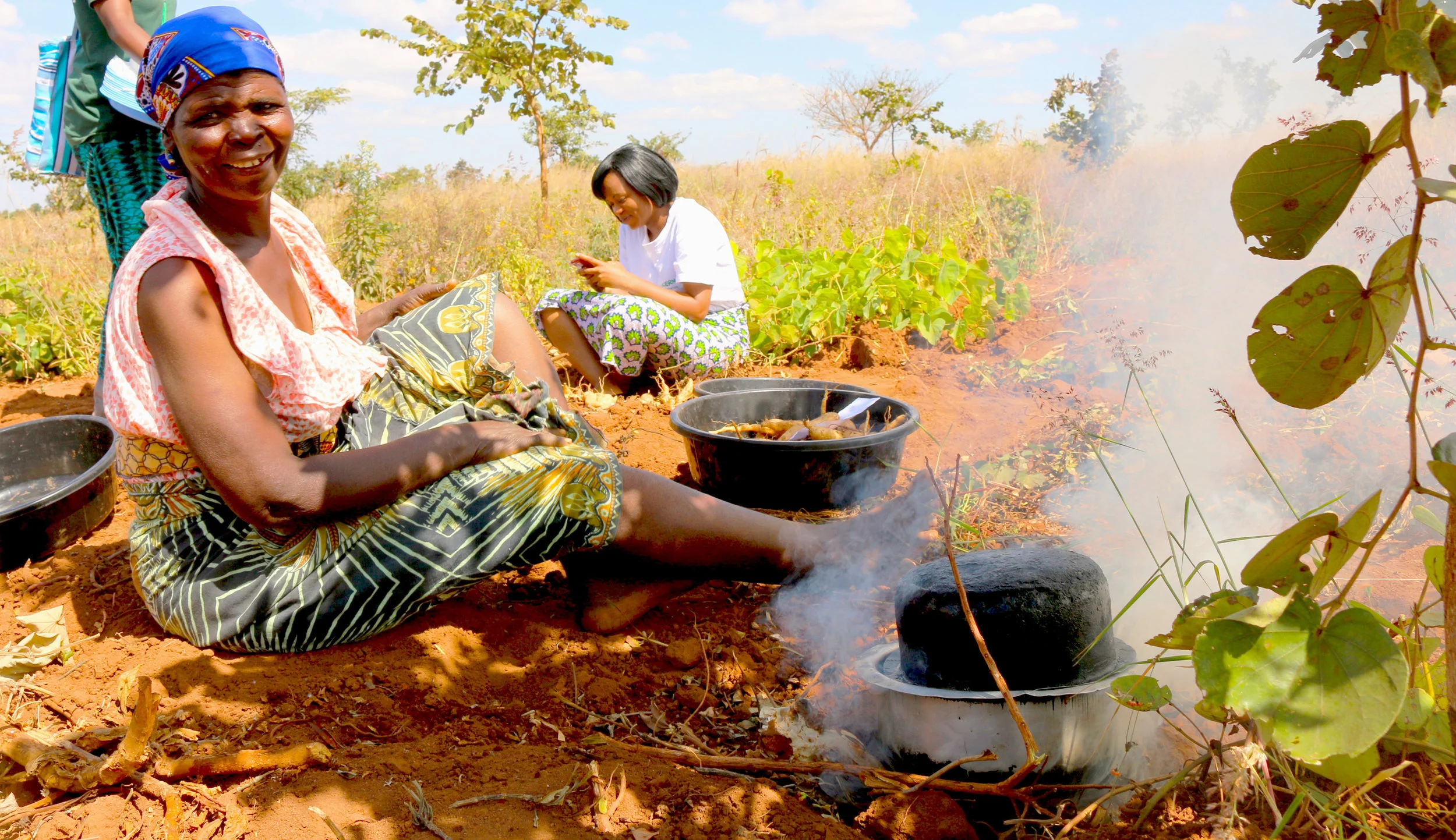 Cooking OFSP in the field SUSTAIN Malawi 2.jpg