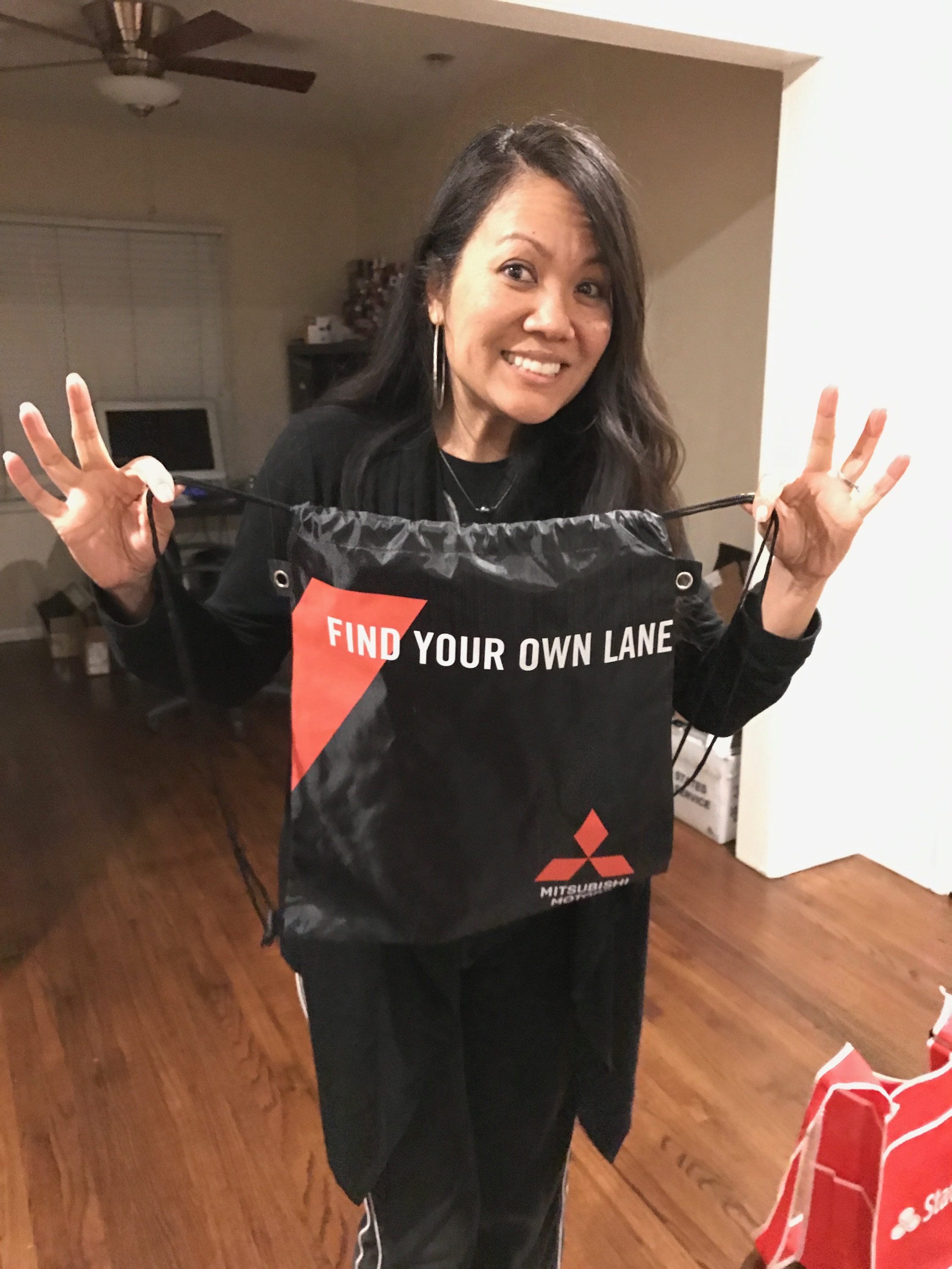 Free drawstring knapsack from Mitsubishi