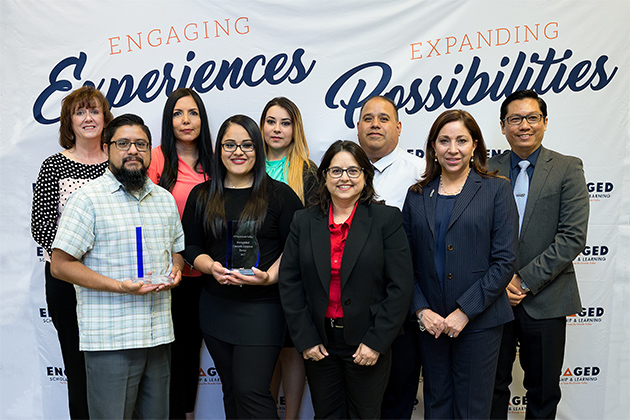 The University of Texas Rio Grande Valley honored the City of Edinburg Solid Waste Management and the United Way of South Texas Wednesday, April 19, with its Distinguished Community Engagement Partner Awards. Pictured in back, from left to right, are Jeanette Ahlenius, board member for United Way of South Texas; Janie Chapa, Dalinda Cardenas, Ramiro Gomez, all from the City of Edinburg Solid Waste Management; and Dr. Dean Kyne, UTRGV assistant professor of sociology. Pictured in front, from left to right, are Fidencio Mercado, United Way of South Texas board member and UTRGV clinical associate professor of rehabilitation services and counseling; Celene Gonzalez, City of Edinburg Solid Waste Management; Dr. Doris Mendiola, data and research manager, UTRGV Community Engagement and Assessment; and Cris Trejo, UTRGV assistant vice president for Community Engagement and Assessment. (Photo by Paul Chouy) 