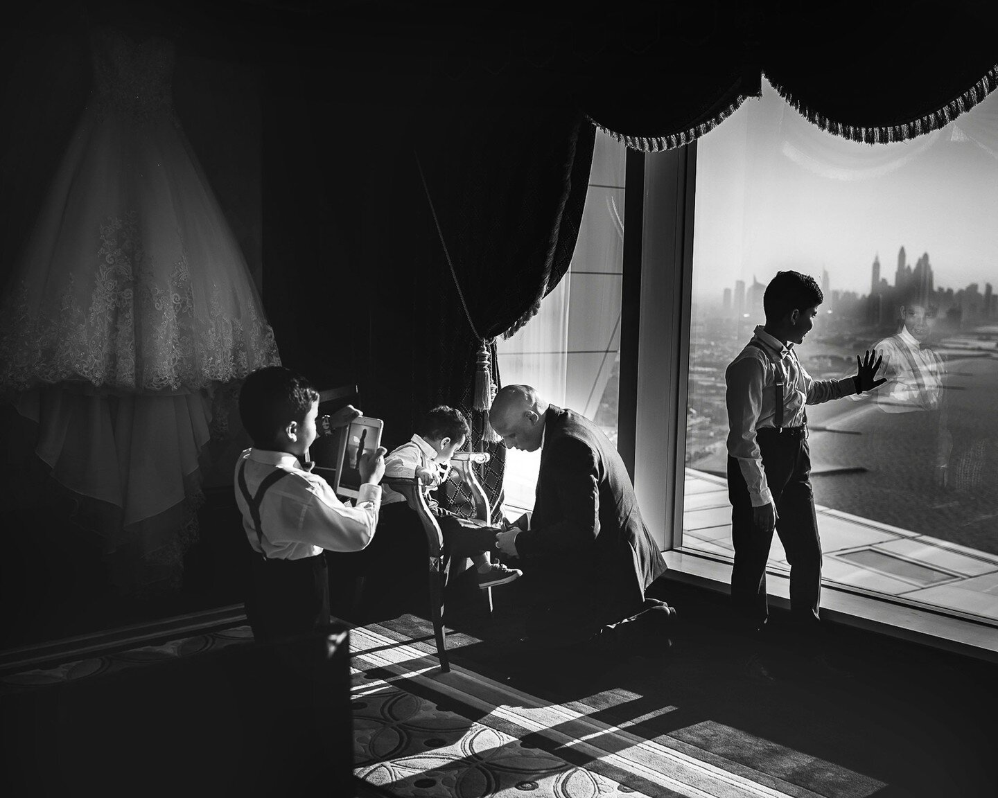 I absolutely love this picture as everyone is busy &quot;in the moment&quot; ❤️ 
#weddingphotography #weddingday #weddingphotographer #wedding #weddings #dubaiweddings #destinationweddingphotographer #photos #blackandwhite #photos #blackandwhitephoto