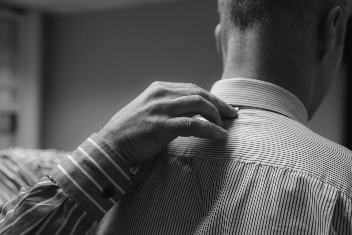 Measuring a client for bespoke, Paul Henry Tailoring .jpg