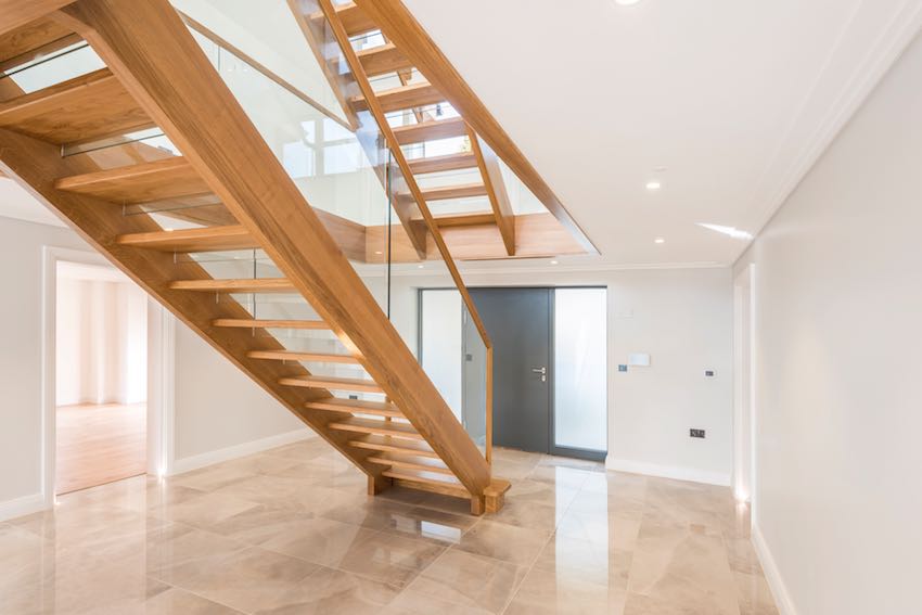 Double height entrance hall with Smet staircase