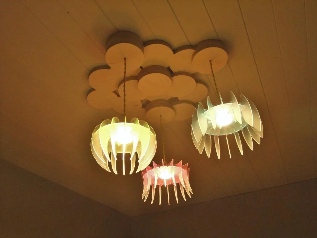 Cluster ceiling rose with pendents and blades.