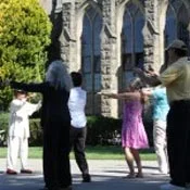 Master Lin Yi Wu leads beginners in the rudiments of Tai Chi.