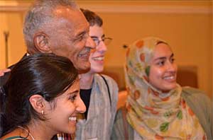 Rev. C.T. Vivian, Dr. Martin Luther King’s colleague in the sixties, poses with three NAIN Young Adult Scholars.