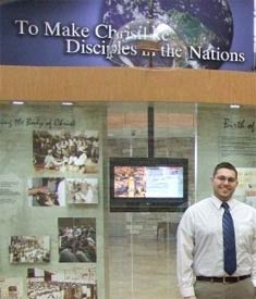 Andrew standing in front of the Nazarene Global Ministry Center