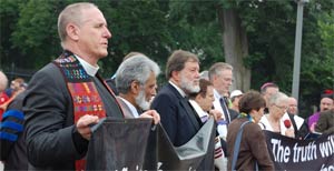 Rev. Ed Bacon, l., protesting in front of the White House last June against torture.