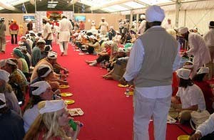 Langar, a free meal, is served by the Sikh community to the thousands attending the Barcelona Parliament of the World’s Religions in 2004. Photo: Rowan Fairgrove
