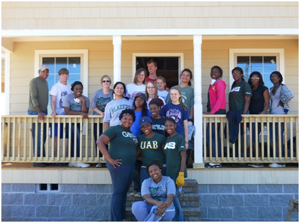 Students at the University of Alabama at Birmingham work to rebuild their community as part of the President’s Interfaith and Community Service Campus Challenge. – Photo: whitehouse.gov