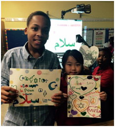 Fourth-graders create works of art, sharing messages of welcome and peace, for a grocery store after an anti-Muslim sign was posted in the common area. – Photo: Serve2Unite