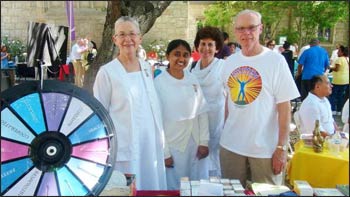 Along with the indoor programs, “Seeds of Peace” featured an outdoor festival with numerous booths such as this Brahma Kumaris table.