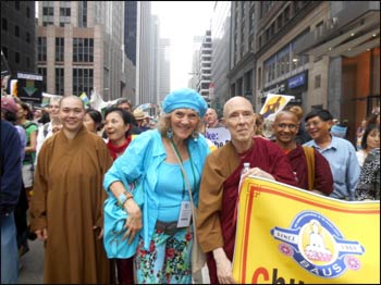 Ruth walking with members of a Buddhist community. – Photo: GreenFaith