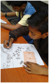 Writing and drawing a Kabir dohe, that is, couplet – Photo: Reena Ginwala