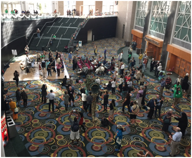 During the Parliament songs and drums from around the world rang out from a dozen sites in the Salt Palace convention center, and in the early morning sacred chanting and singing was piped throughout the facility. – Photo: TIO