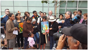 This public action co-sponsored by ICIR was held in support of unaccompanied children and families fleeing violence in 2014. – Photo: ICIR-CLUE