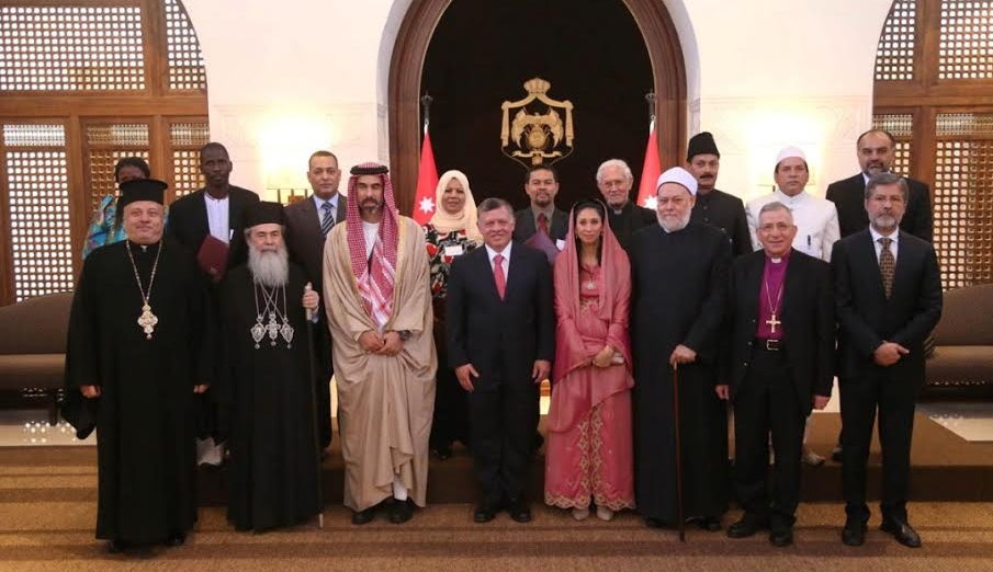 His Majesty King Abdullah II with award winners following the 2014 World Interfaith Harmony Prize. Buyondo Micheal is second from the left in the top row.