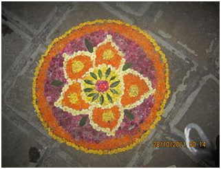 Flower Rangoli: Wikimedia Commons, Katyare