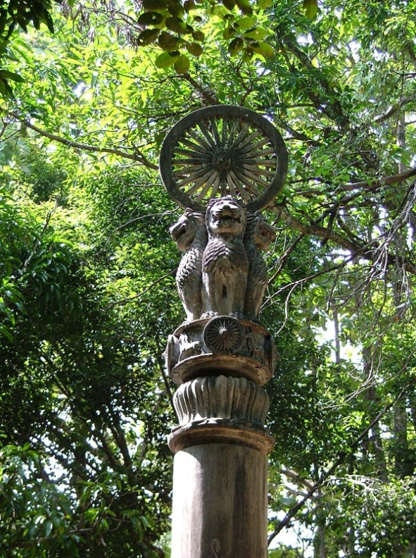 Normal
0
false
false
false
EN-GB
X-NONE
HE
A Pillar of Aśoka raised in Chiang Mai, Thailand, with the four lions of India atop a traditional Aśokan pillar, crowned with the Aśokan Chakra symbolizing “the Wheel of Righteousness” – Photo: Wikipedia, L. N. Roychoudhury