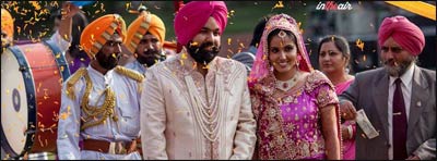 Marigold petals rain on a traditional Sikh wedding. – Photo: Facebook/Sikh Matrimonial, Sikh Girls, Sikh Boys, for marriage in USA/UK/India