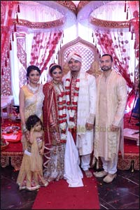 From the l., Kavita with a hand on her daughter Maya, Hiral, Poumil, and Sachin – Photo: House of Talent Studio