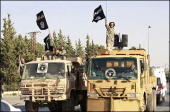 IS troops rolling into Syria’s Raqqa province. – Photo: World Tribune