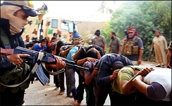 An ISIS photo purporting to show the execution of Iraqi Shias. – Photo: The Telegraph