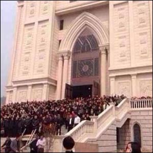 Church members protest government plans to demolish their new sanctuary. – Photo: Asia News