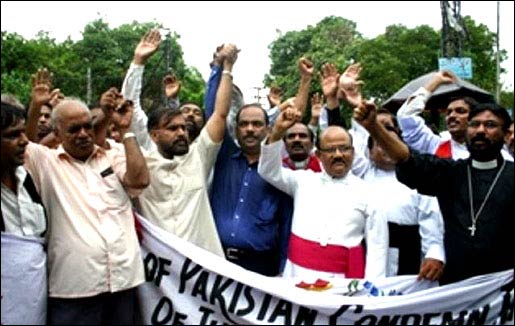 A URI circle in Lahore, Pakistan, protests the burning of sacred scripture.