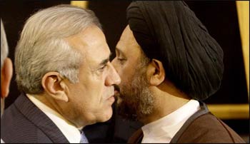 Shiite cleric Ali Fadlallah (R), son of Lebanese Grand Ayatollah Sayyed Mohammed Hussein Fadlallah, receives condolences for the death of his father from Lebanese President Michel Suleiman at a mosque in Beirut’s southern suburb, July 4, 2010. - Photo: Al Monitor