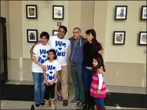 The Nowrouzi (l.) and Edry children don’t speak the same language, but when the families met, they became instant friends.