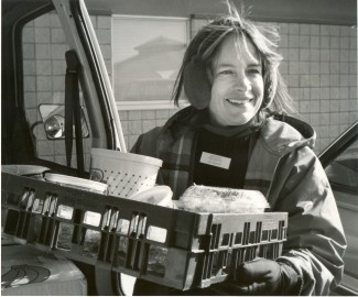 Jill Bullard back when the Food Shuttle began, inspired by the day she bought and gave away 11 breakfast sandwiches. – Photo: Inter-Faith Food Shuttle