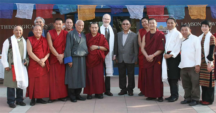 GTU President Riess Potterveld (center) with Venerable Thepo Rinpoche, the 8th Thepo Tulku (6th from left), and members of the Northern California Tibetan Community at an exhibition of Tibetan art and artifacts at Flora Lamson Hewlett Library at the Graduate Theological Union.