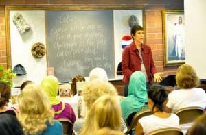 Nancy Davis, a cancer survivor, speaks to a room filled with women on how to handle unexpected challenges in life. Photo: Kathe Espinili