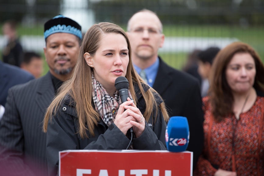 Ms. Sari Heidenreich, North America regional coordinator of United Religions Initiative, speaks at a press conference in front of the White House, during Out of Many, One. – Photo: Steven D. Martin/National Council of Churches.