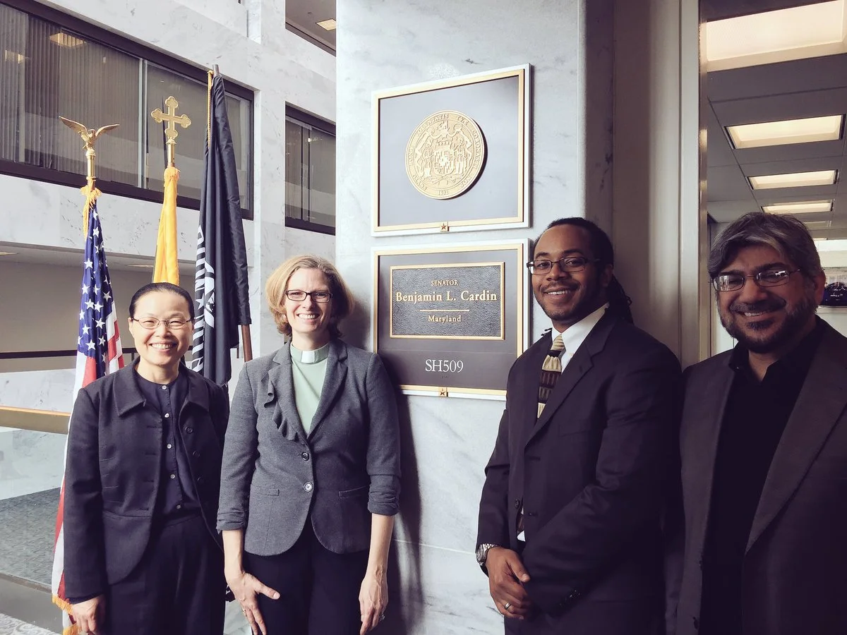 Ven Chung Ohon Lee (Won Buddhist), Rev. Rachel Corwell (United Methodist), and Naeem Baig (r.) (Islamic Circle of North America) are greeted by staff (in the tie) as they visit Sen. Benjamin L. Cardin’s office on Capitol Hill. – Photo: Rachel Cornwell