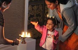 Nothing beats visiting someone else’s sanctuary to if you really want to understand them, as this child found out on the Faith House Manhattan Tour Bus. See the story below. – Photo: Sean McGinn, Faith House Manhattan