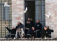 Franciscan friars free doves during the interfaith peace meeting at the Basilica of St. Francis in Assisi, Italy, Oct. 27. Photo: Giampiero Sposito, Reuters