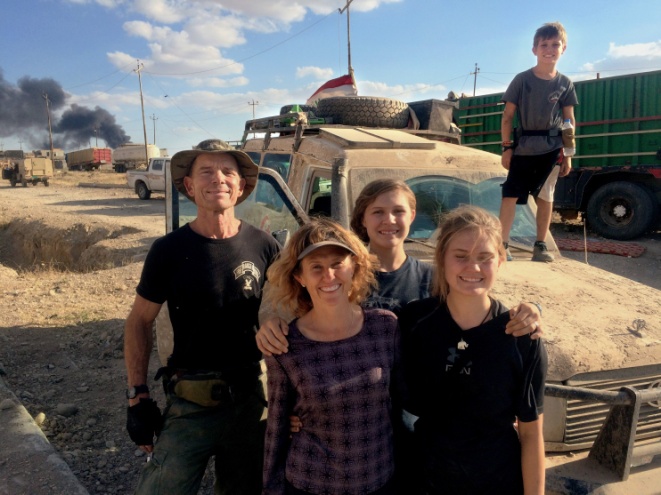 David and Karen Eubank with their children Sahale, 16, Suuzanne, 14, and Peter, 11, next to their armored ambulance in Mosul. – Photo: Washington Post, Family Photo
