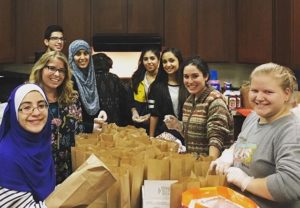 Students from different religious and spiritual traditions from a high school in Richmond, VA participate in service projects together. – Photo: URI
