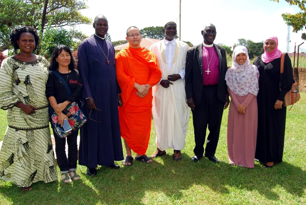 An interfaith gathering in the Great Lakes region of Africa. Despina is on the left. Photo: URI Great Lakes Region, Facebook