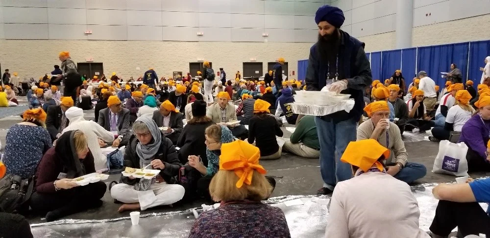 Guru Ka Langar being served at 2018 Parliament of World’s Religions in Toronto, Canada – Photo: Tarunjit Singh Butalia