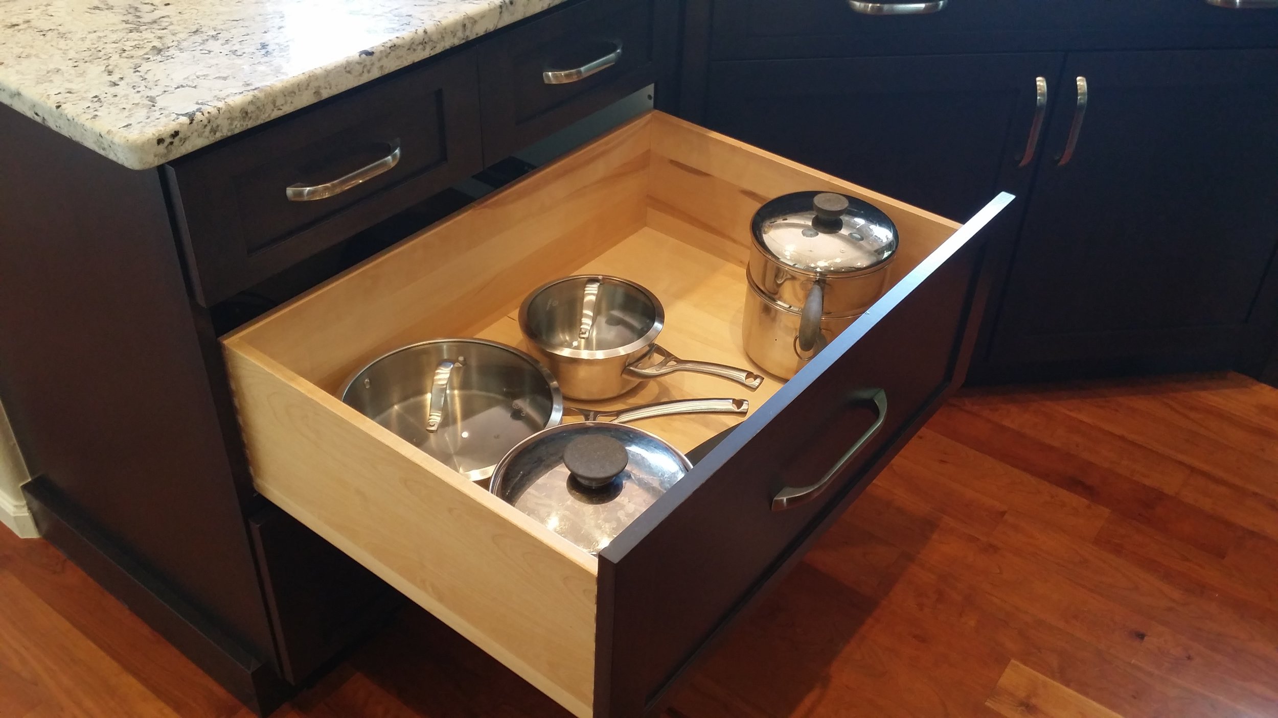 Solid wood drawer boxes are a nice addition to any kitchen that doesn't already have them. Constructed from solid 5/8" thick birch with dovetailed corners on heavy duty full extension under mounted soft close slides. 