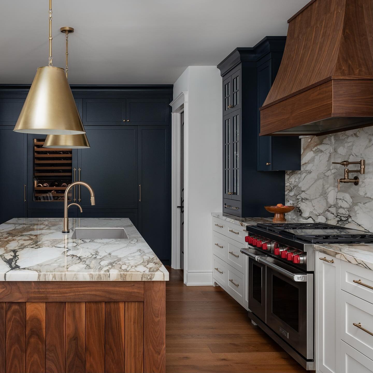 Rich colours take main stage in this kitchen remodel, and we can&rsquo;t get enough of the dark black cabinet colour with dark blue undertones. Soot (2129-20 by Benjamin Moore) is an understated - serious, even -  warm black with versatility. It also