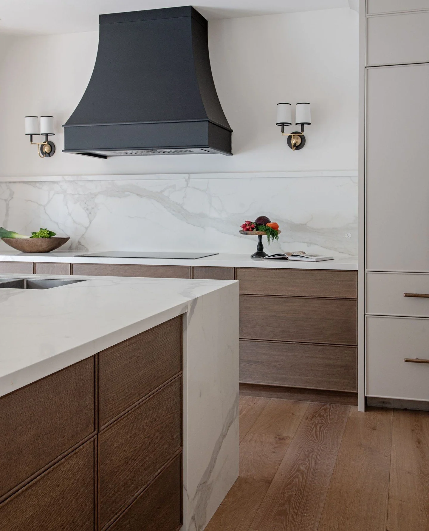 We approached the design of this kitchen with a certain mindset. The mindset was &quot;We want a beautiful kitchen but we don't want anything on the counters. We want to see the beautiful kitchen, not our stuff&quot;. Simple enough, and we were happy