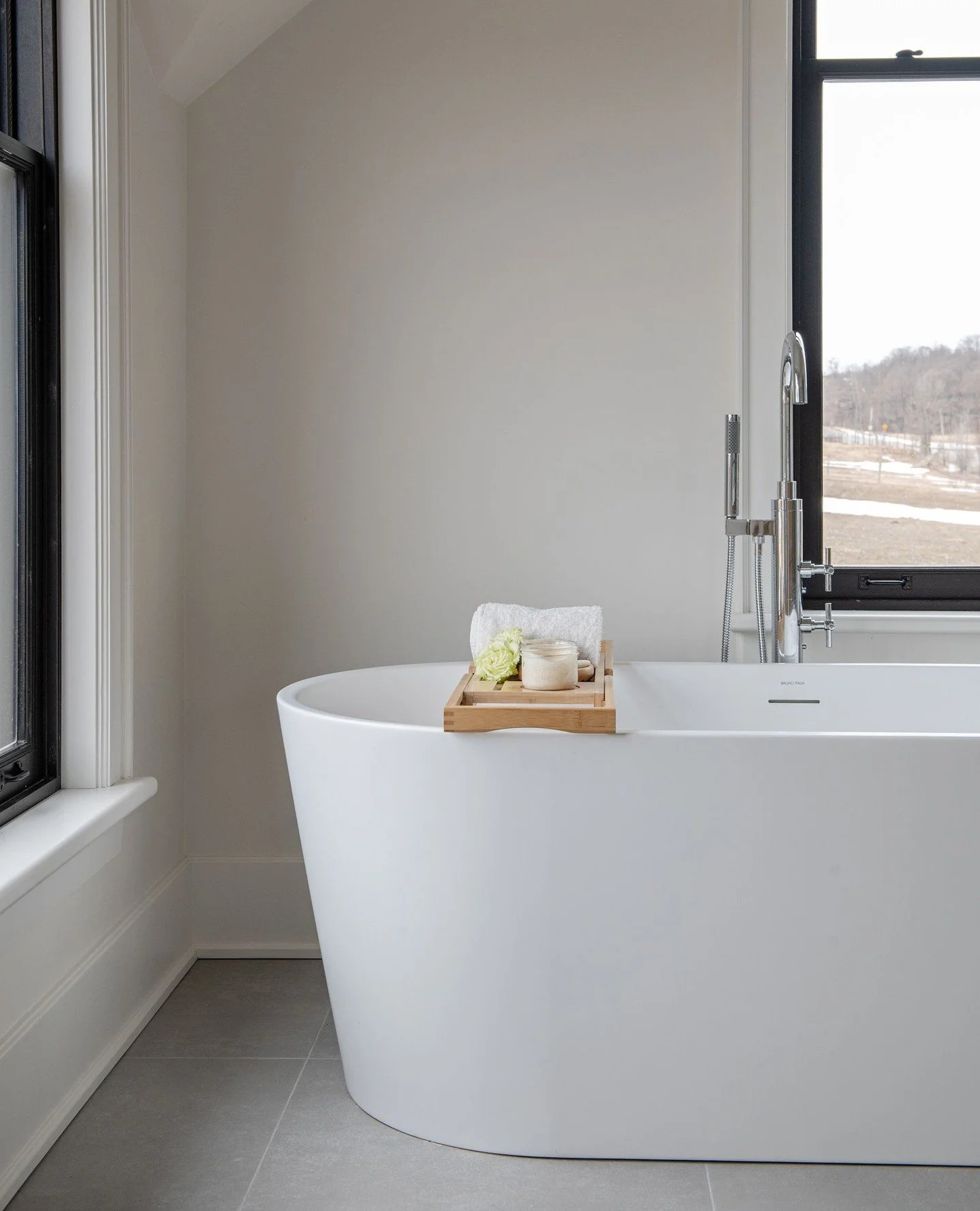 Doesn't get much simpler than this. A calm and quiet spa moment in a soft matte white soaker tub on gently heated floors, panoramic windows with field-views for days, and an aromatic soy candle that lifts the stress away bit by bit. Actually, somethi