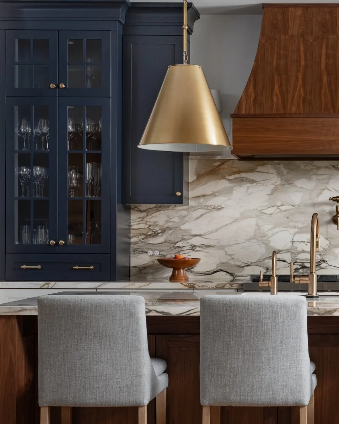 We&rsquo;re still swooning over this backsplash. But of course the custom walnut island and rich blue cabinets also pack a punch. Plus other little design details&hellip; small but mighty. 

#gairdnerdesign 
#farmhousedesign
#hometohaven

photos @dan