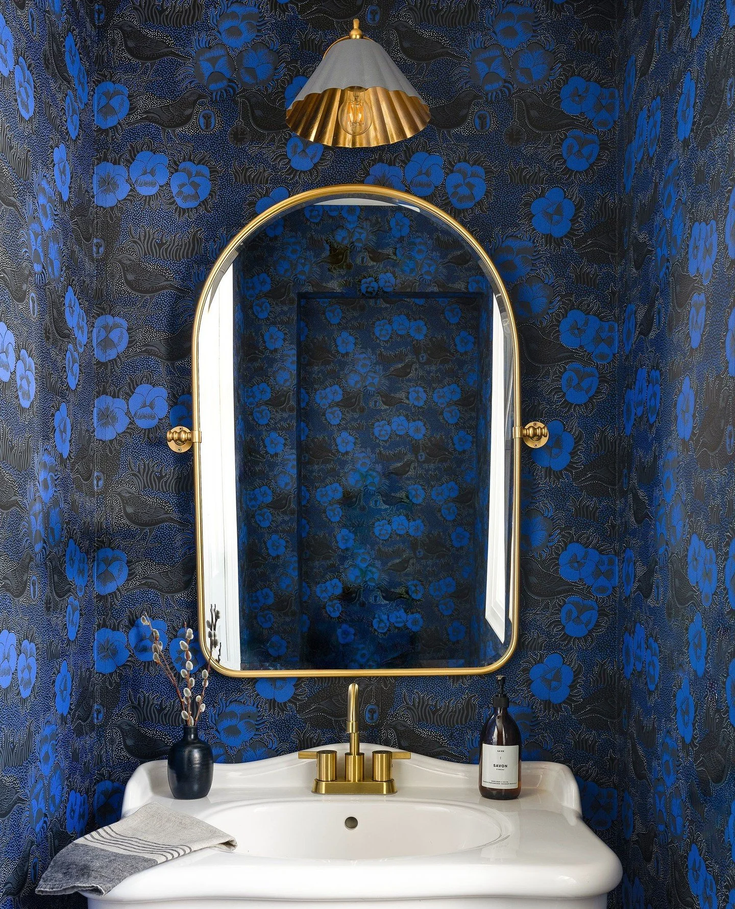 Sometimes it's the little spaces in our home that captivate, that pull us to stand a little longer and ponder. This powder room is such a space; where morning light peaks in and awakens the room. Gorgeous blooms of cobalt blue, smoky blackbirds and w
