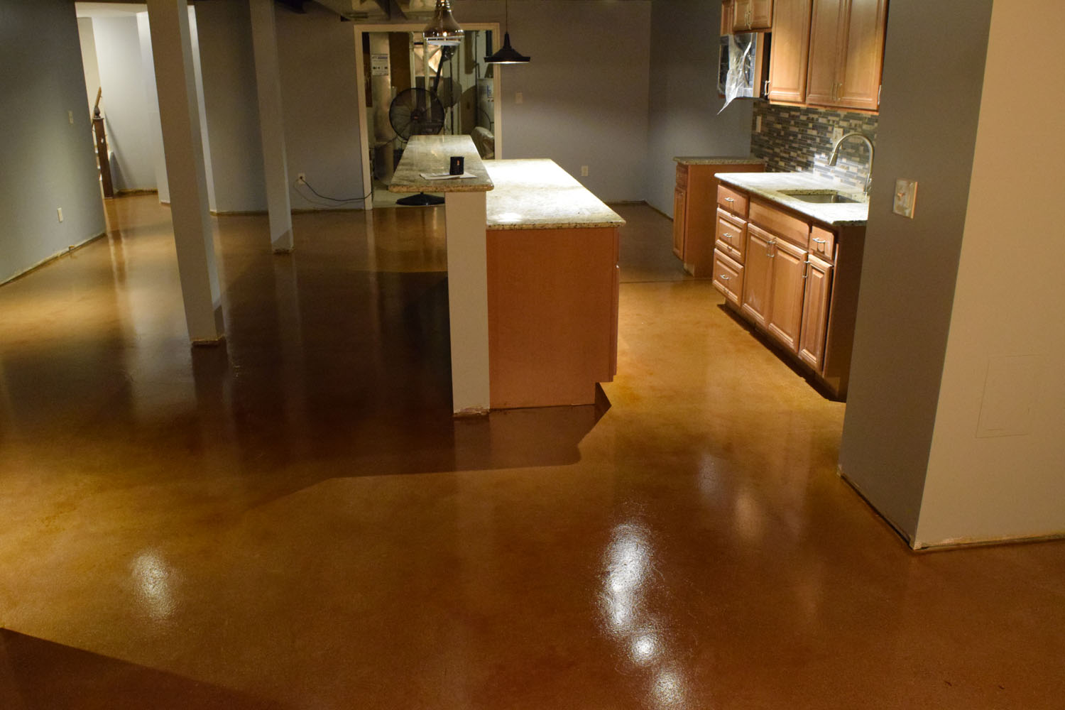 Acid-Stained Basement Concrete Floor. Brickform Blushtone and Decopoxy