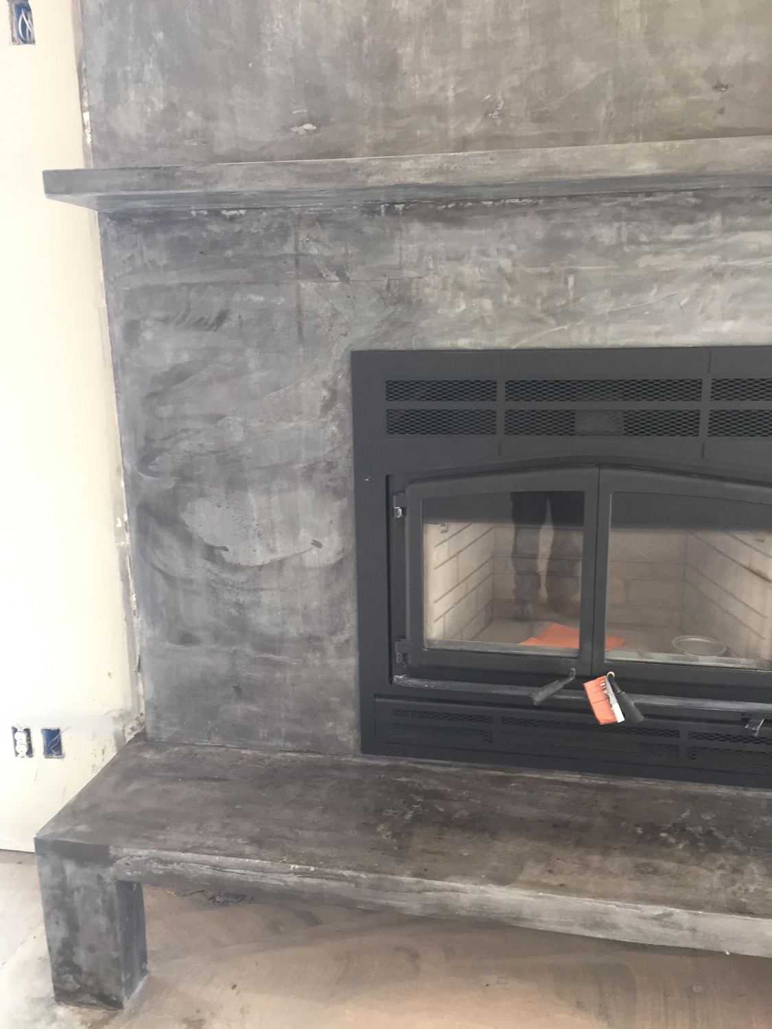 This is a custom fireplace that we did for a customer using natural concrete.