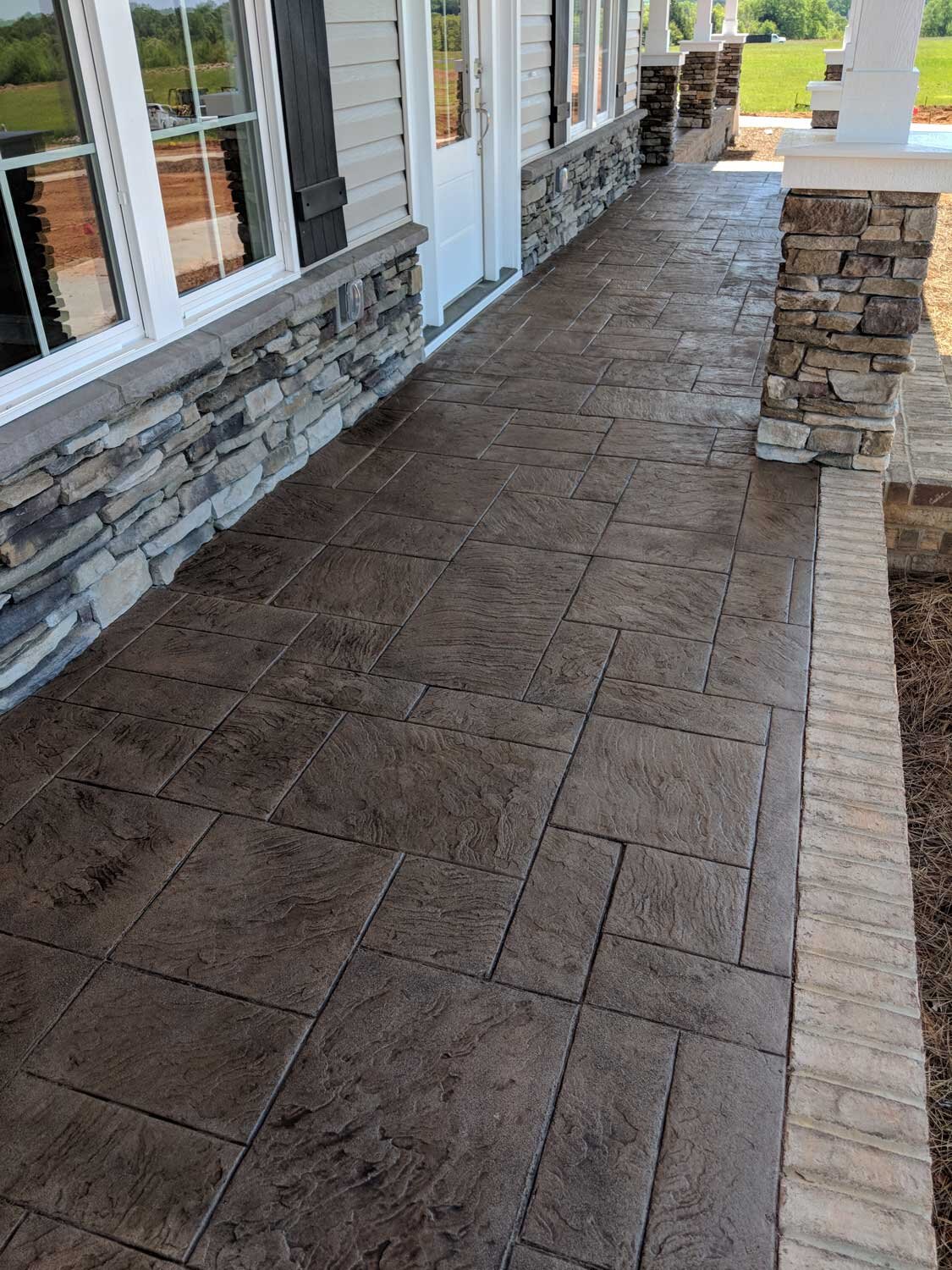 Regal Ashlar stamp pattern, Desert Sand integral Color with Walnut Antique it.